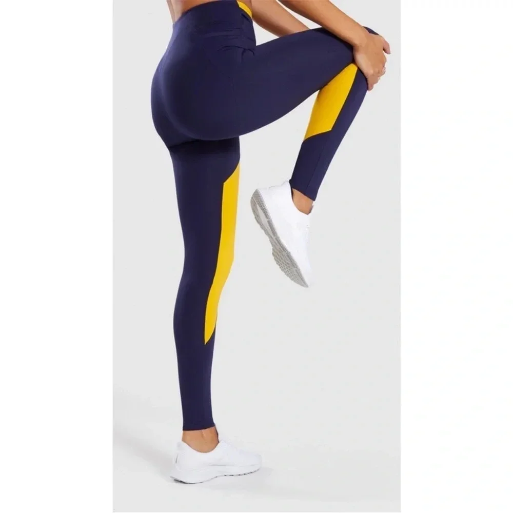 Gymshark Navy Blue Yellow High Rise Asymmetrical Crossover Leggings Size Small